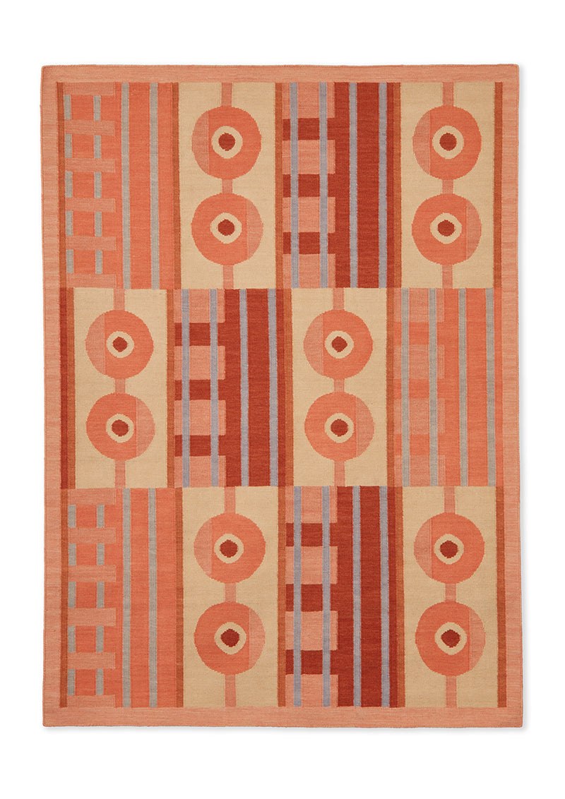 Power in Tangerine geometric wool rug seen from above
