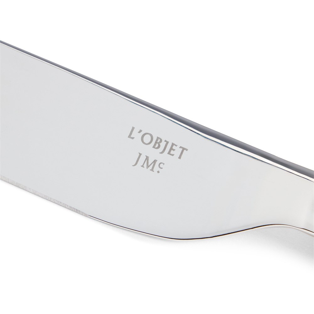 Close view of the polished dinner knife blade