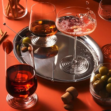 Splash coupe and lowball glasses with sculpted ripple bases