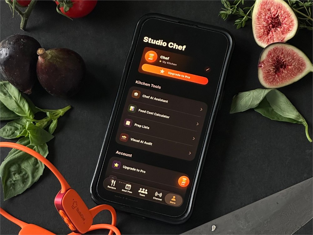 StudioChef KAI headset beside a cooking assistant phone interface