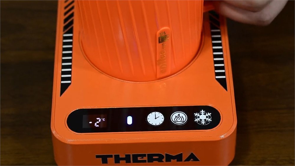 THERMA coaster cooling a drink with the front display visible