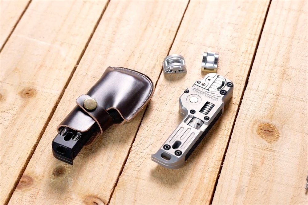 Tiwrench with interchangeable jaws and optional leather sheath