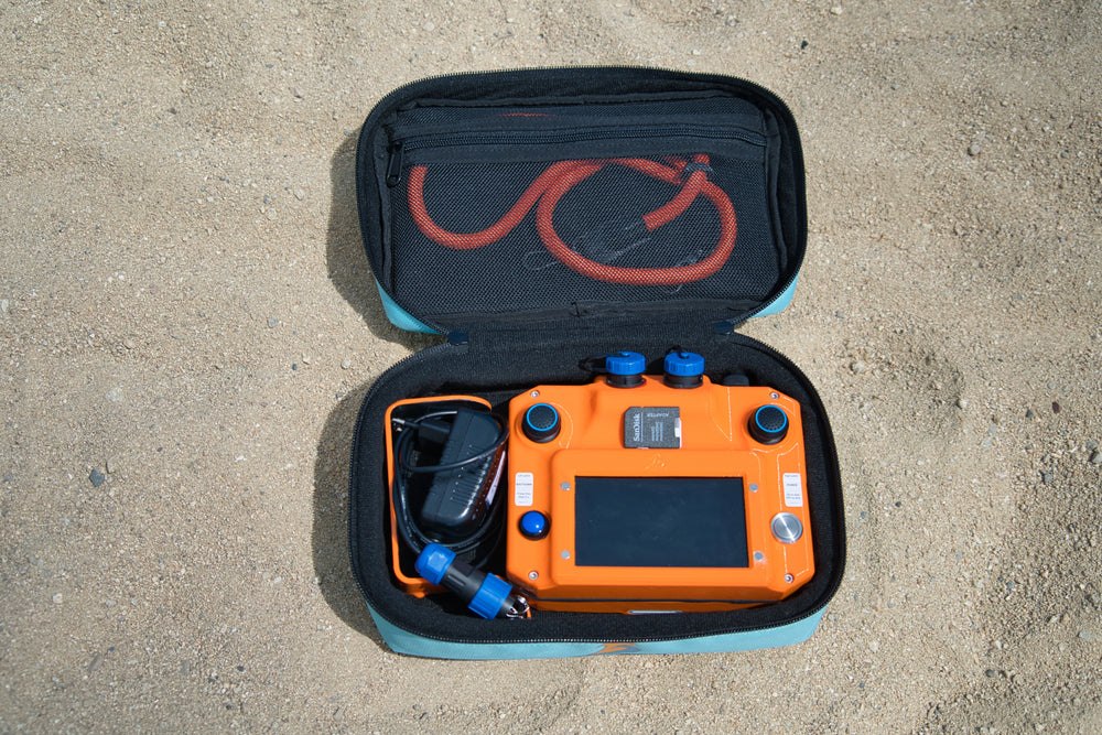 Underwater drone controller packed in its carrying case