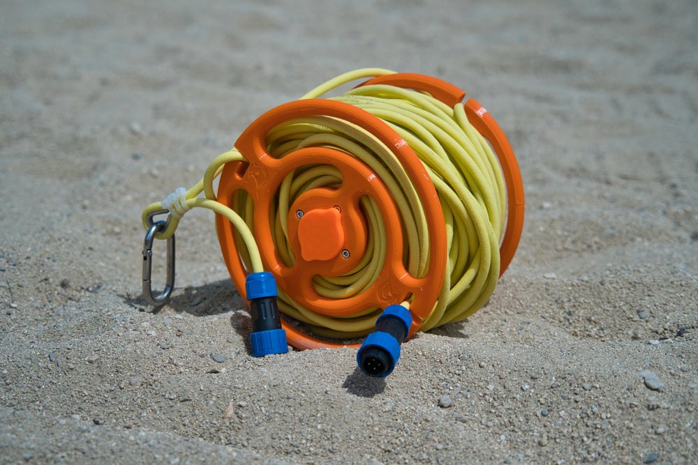 Thirty-meter tether wound on the orange cable reel