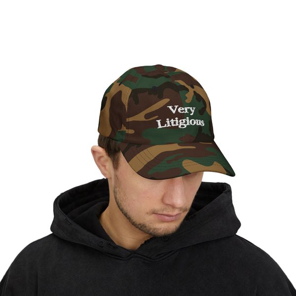 Green camo Very Litigious hat worn from a front angle