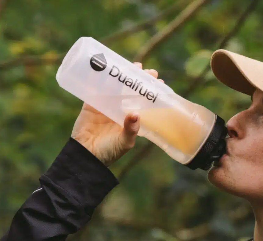 Person drinking from the Dualfuel sports bottle