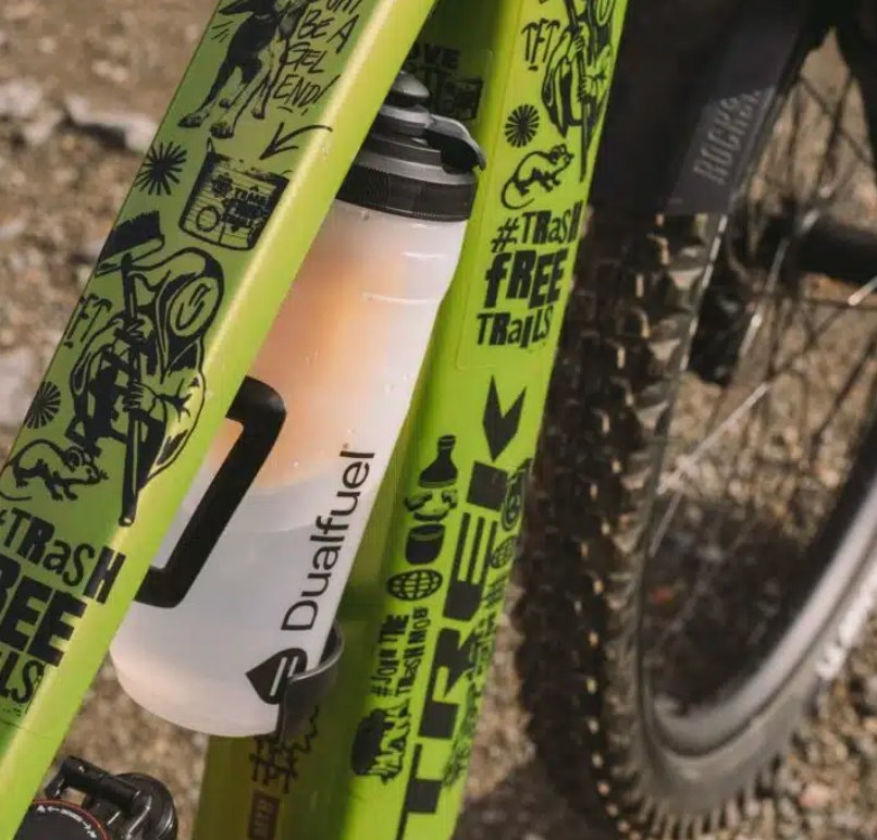 Dualfuel sports bottle in a bicycle frame cage