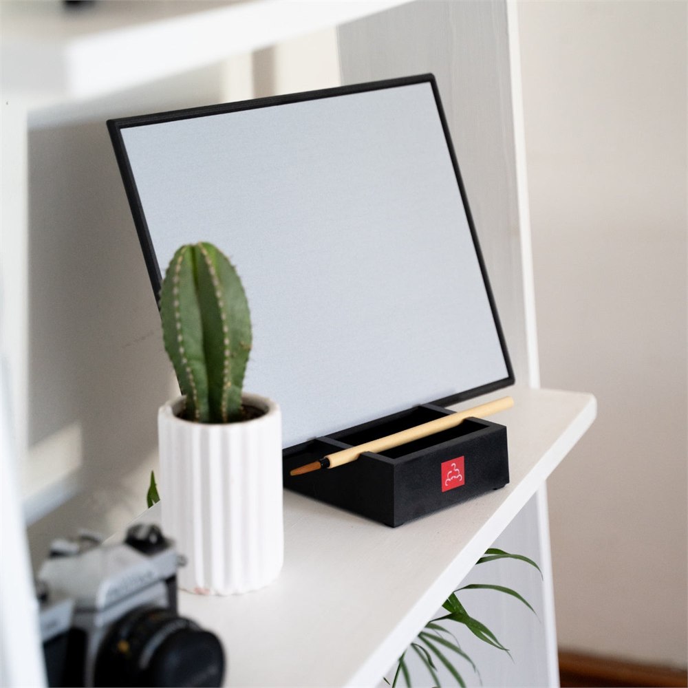 Blank water painting board resting on a shelf
