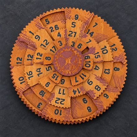 This Wooden Math Dial Puzzle Makes Twelve Columns Add Up to 42