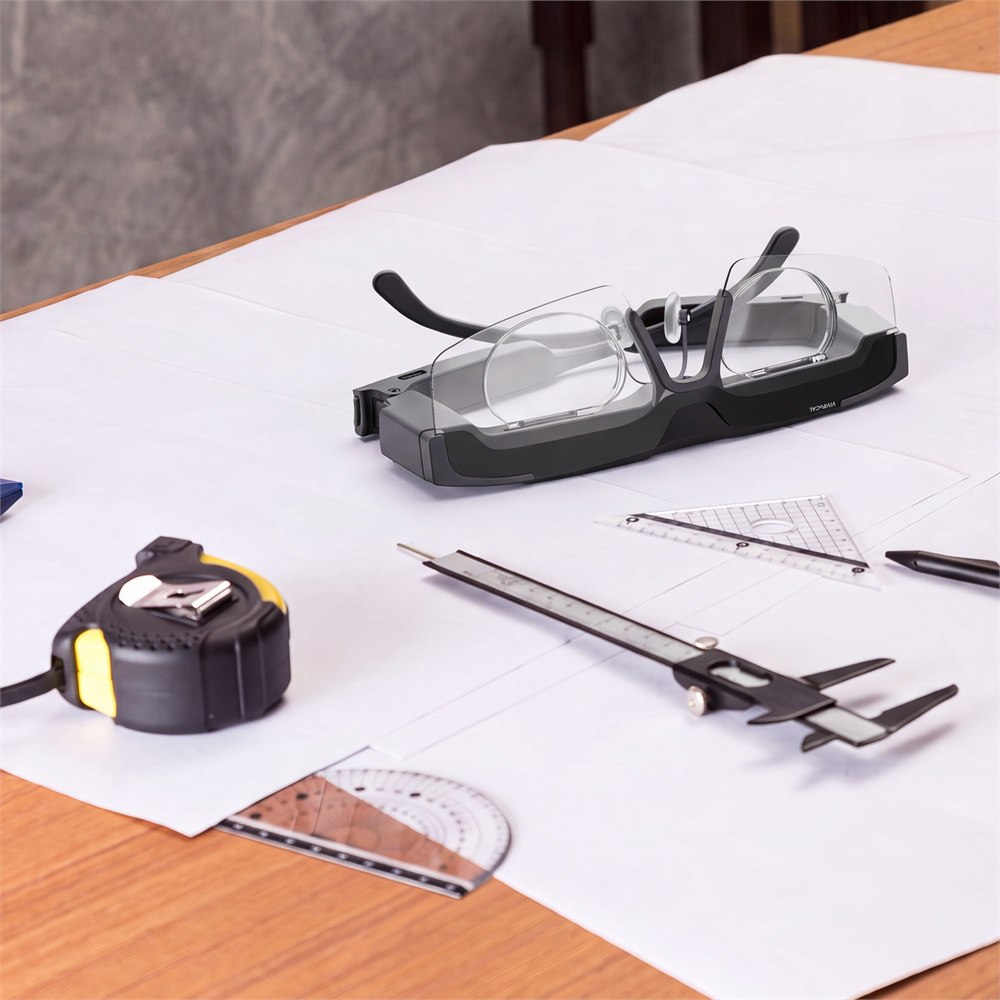 VIVIFoCAL S1 glasses beside measuring tools and drawings