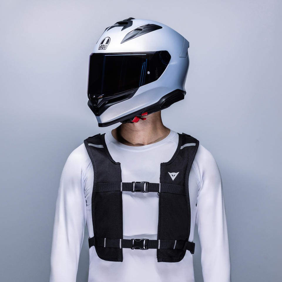 Helmeted rider wearing Smart GO over a white shirt