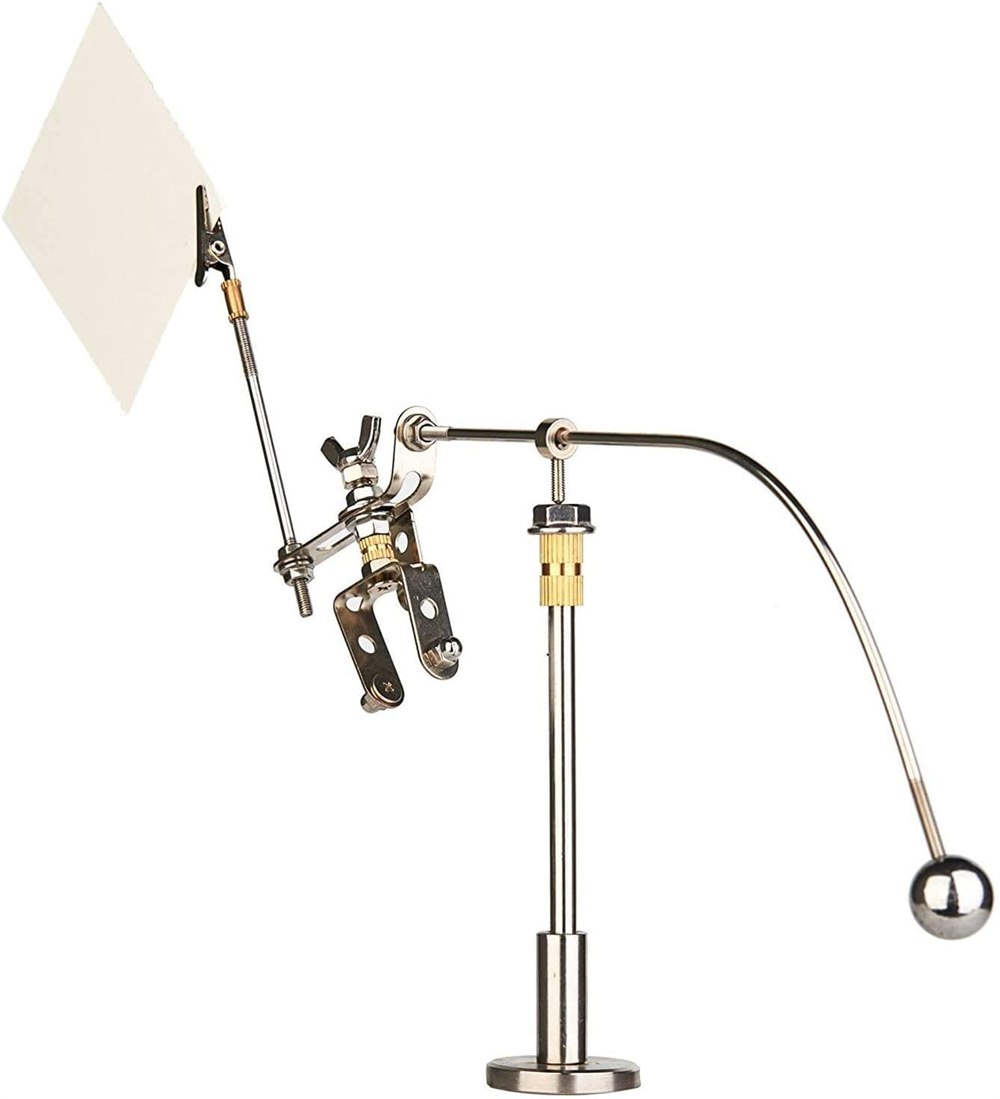 Reverse view of the metal robot and memo clip on its balancing stand