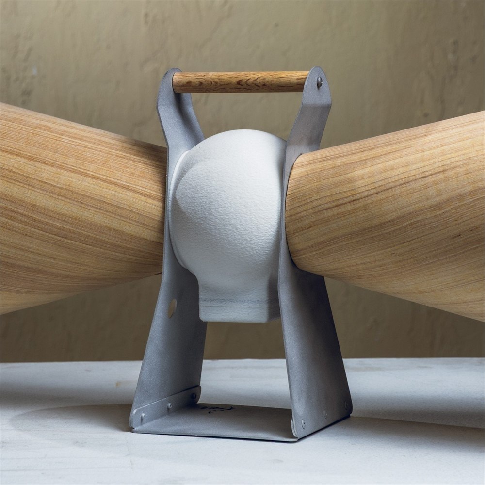 Rear view of the speaker showing its handle and folded metal support frame
