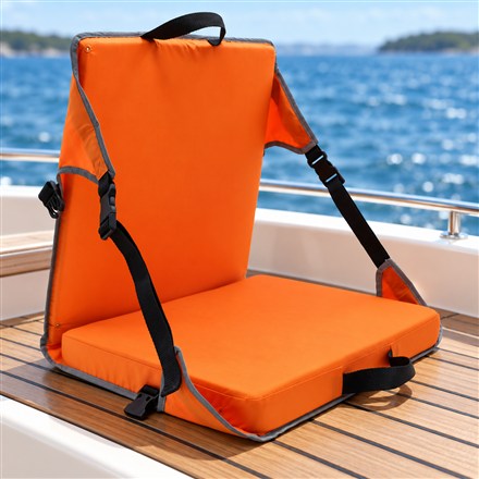Orange legless folding boat chair on a teak boat bench