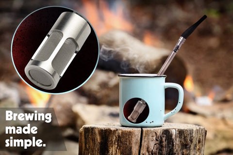 JoGo brewing straw in a camp mug with a close view of its mesh filter
