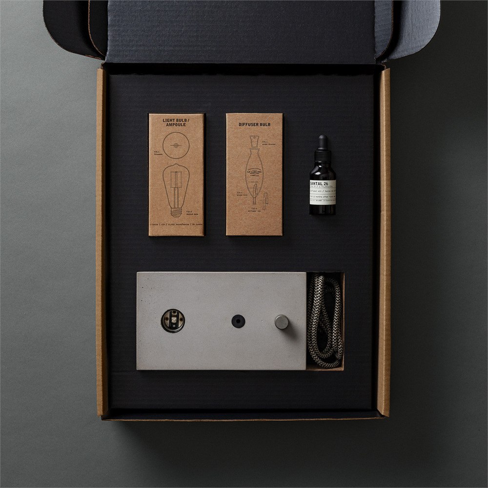 Concrete diffuser base, oil and separately packed bulbs inside the box