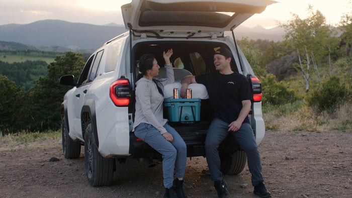 Hele Ice Box partially extended for use as a tailgate drink surface