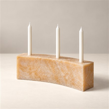 These Curved Stone Candleholders Hold Three Candles in a Sculptural Arc