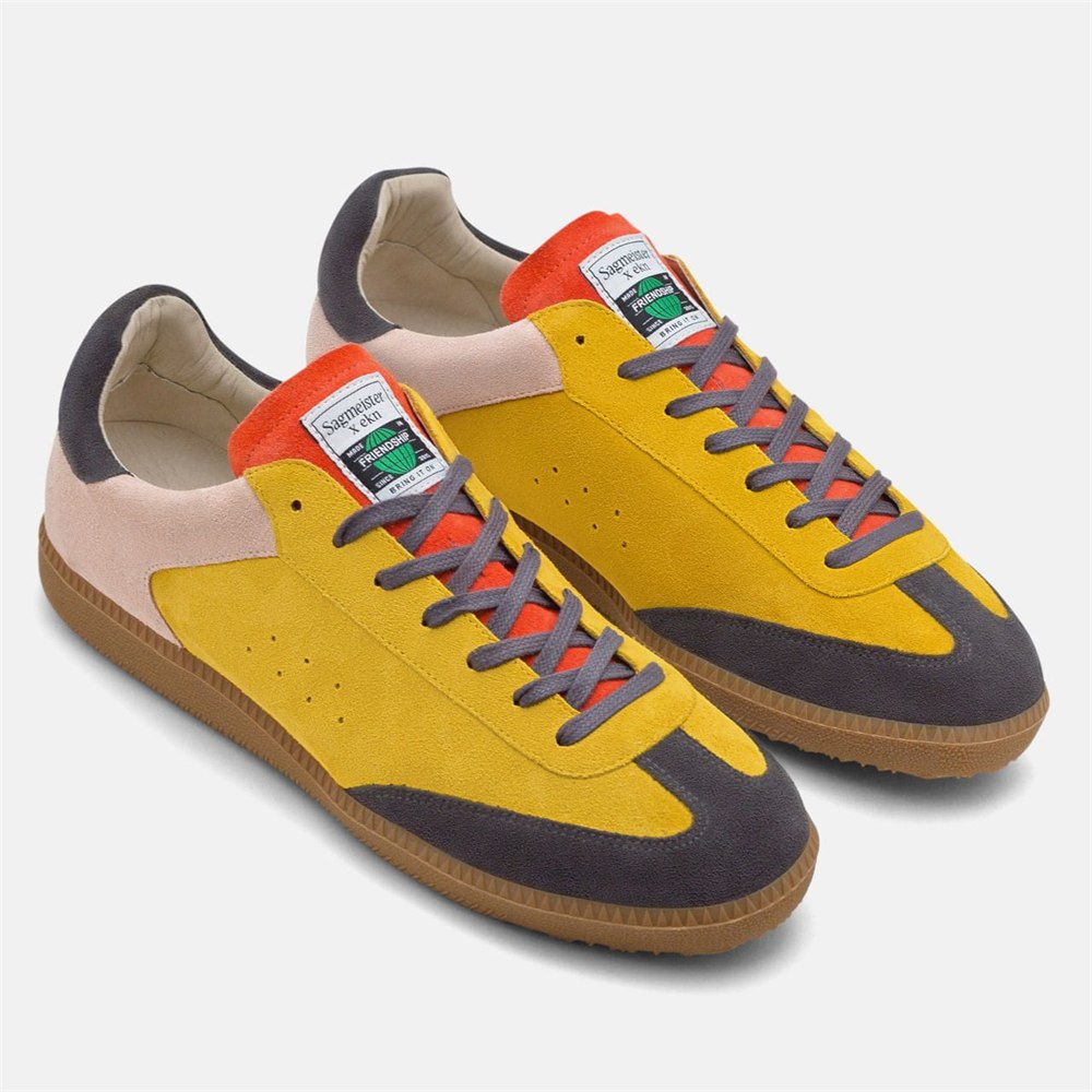 Bring It On yellow suede sneaker pair in three-quarter view
