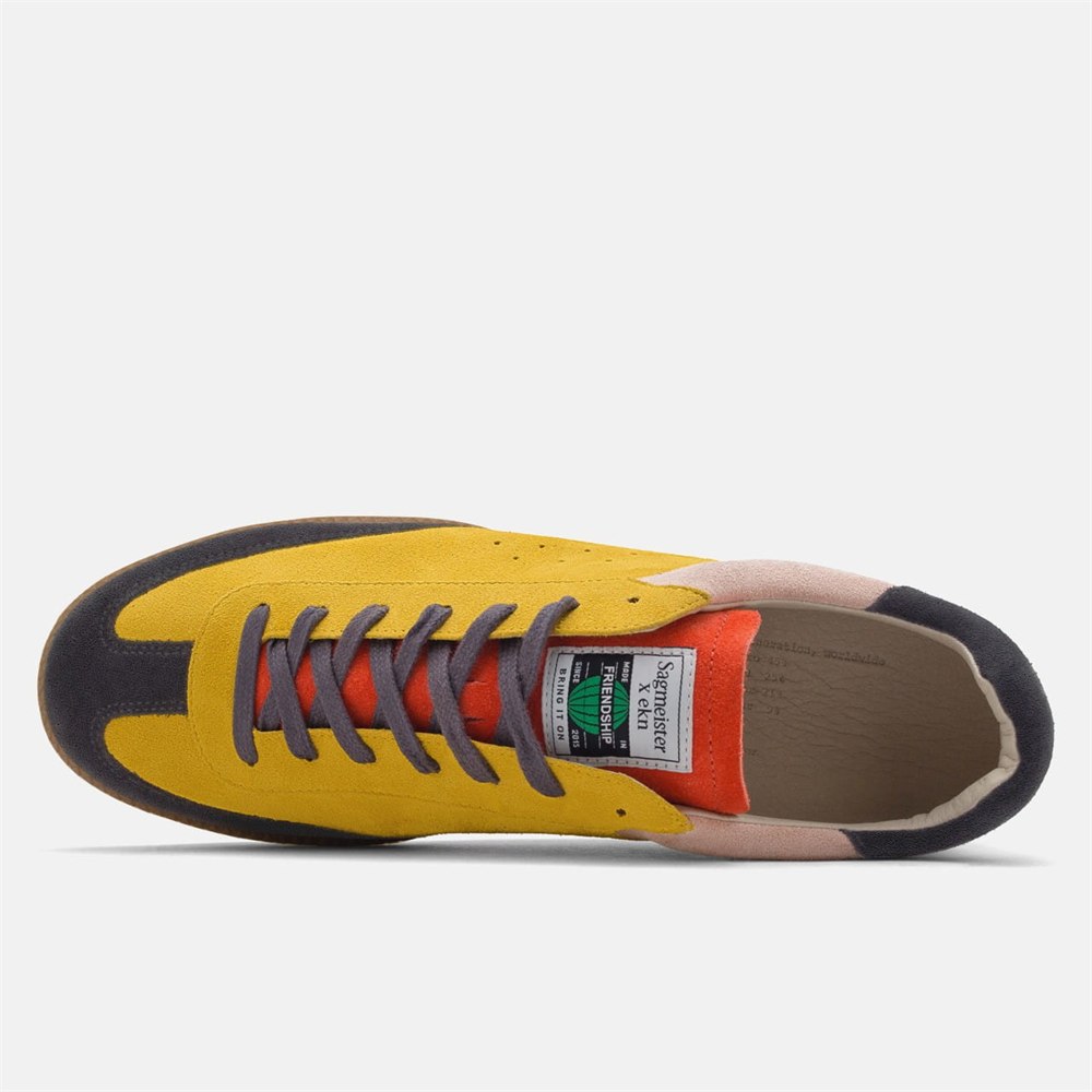Top view showing gray laces and orange tongue