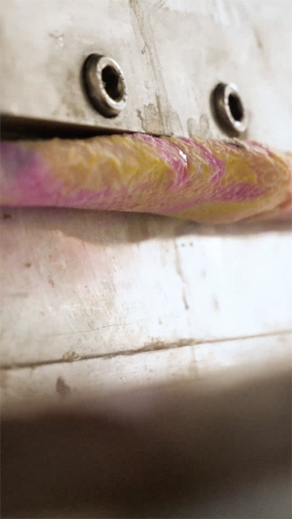 Pink recycled plastic being processed in the Barbie x gomi workshop