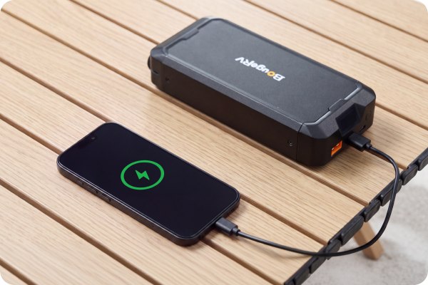 Removable wagon battery charging a phone