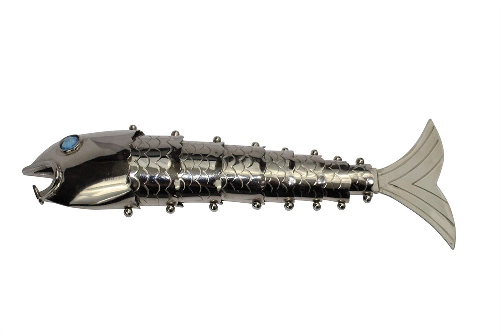 Straight side view of the segmented chrome fish opener
