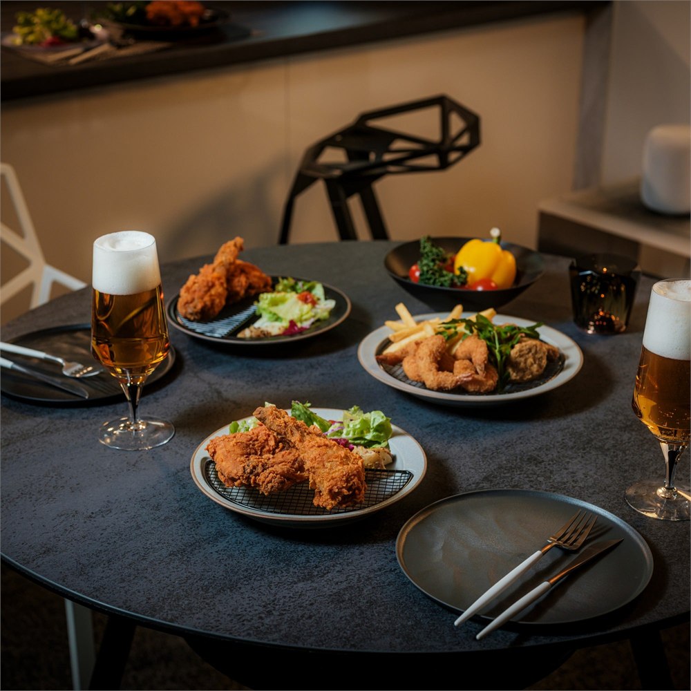 Half-Moon Plates arranged for dinner on a dining table