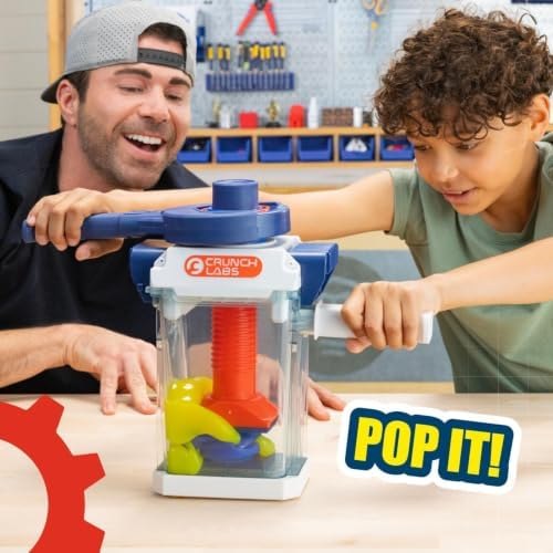 Mark Rober and a child demonstrating a popping experiment