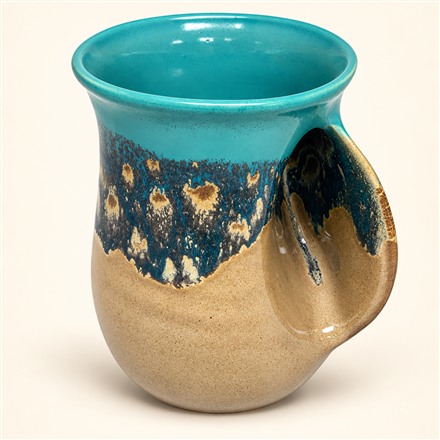 This Handwarmer Coffee Mug Has a Ceramic Pocket That Hugs Your Fingers