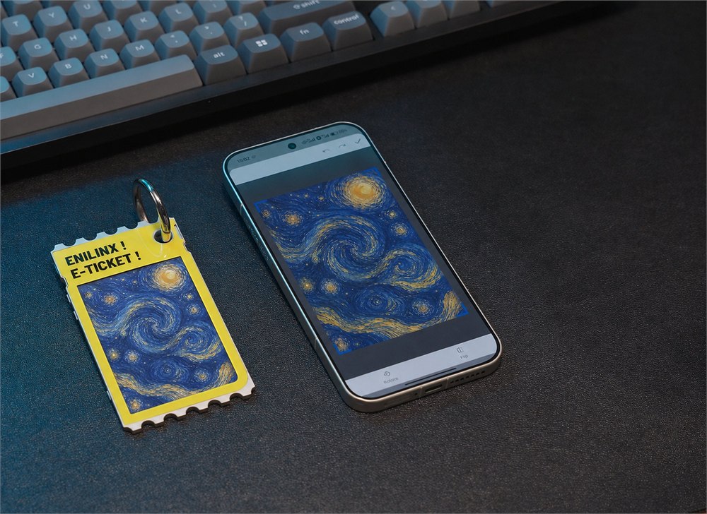 TICKEY color e-paper display beside a phone showing matching artwork