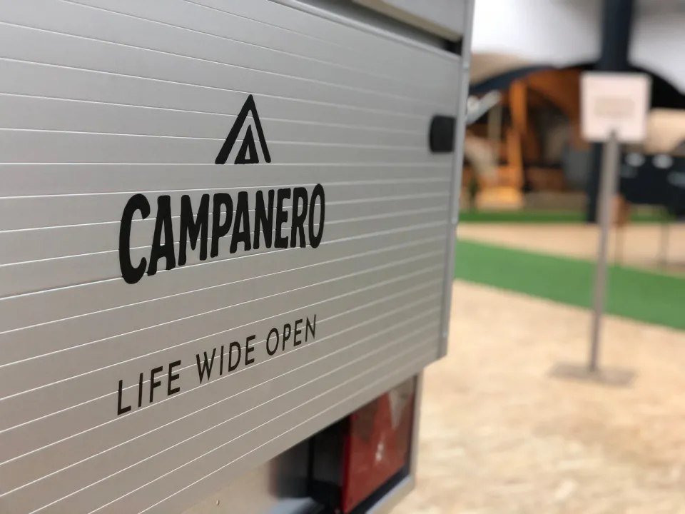 Campanero branding on the silver trailer body