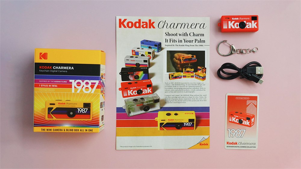 Charmera camera package with cable, keyring, leaflet and card