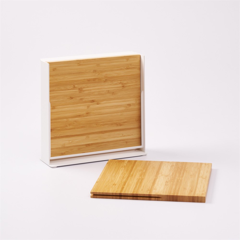 Bamboo board removed beside its knife stand