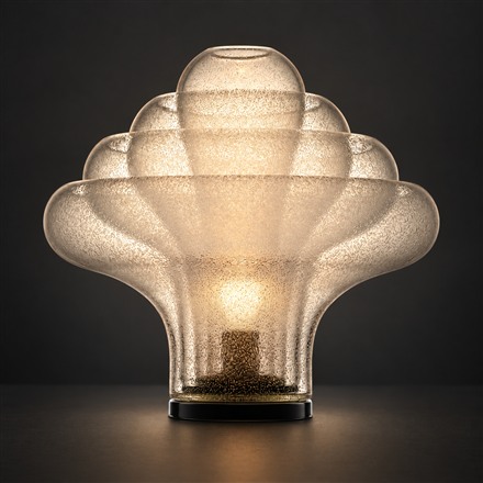 This Layered Glass Table Lamp Turns Four Nested Shades Into a Glowing Flower