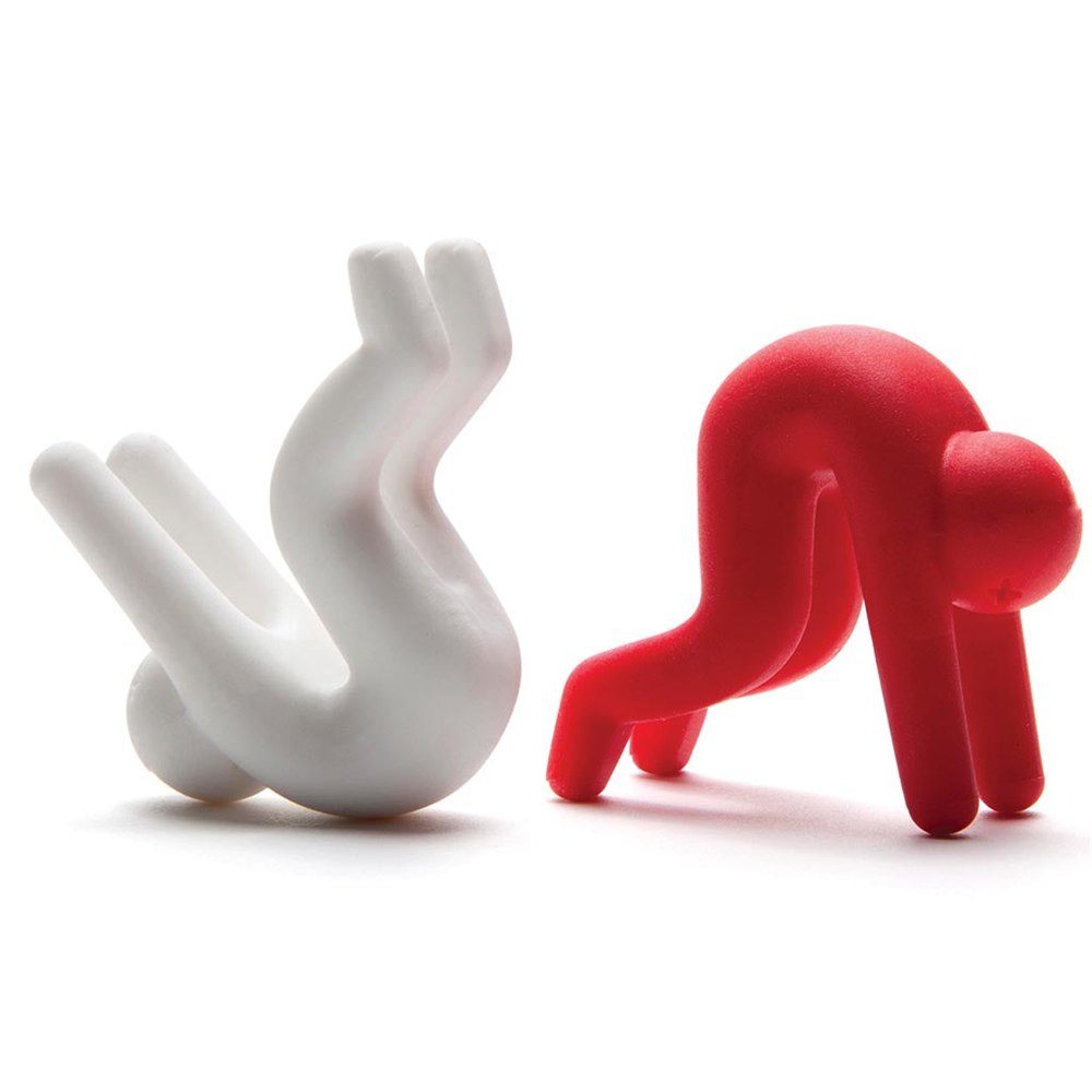 Red and white silicone Lid Sid figures showing their curved bodies