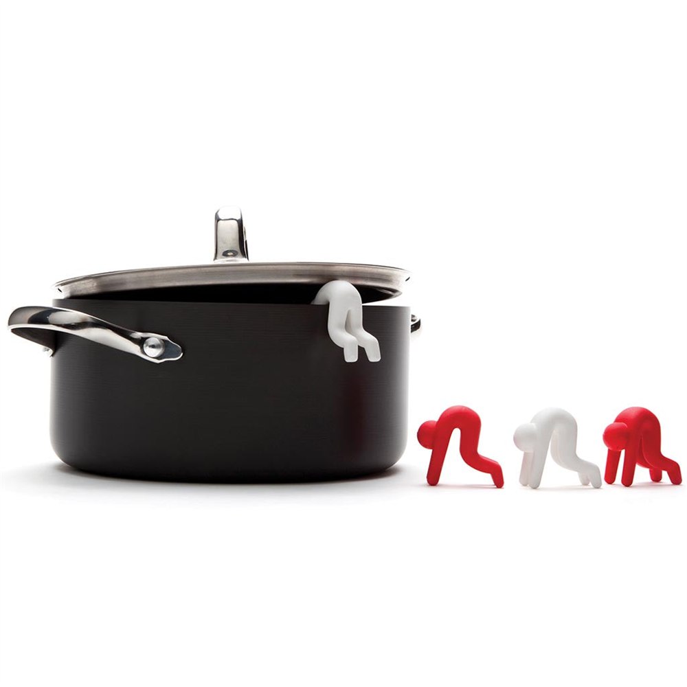 White Lid Sid holding a pot lid open beside additional product display figures