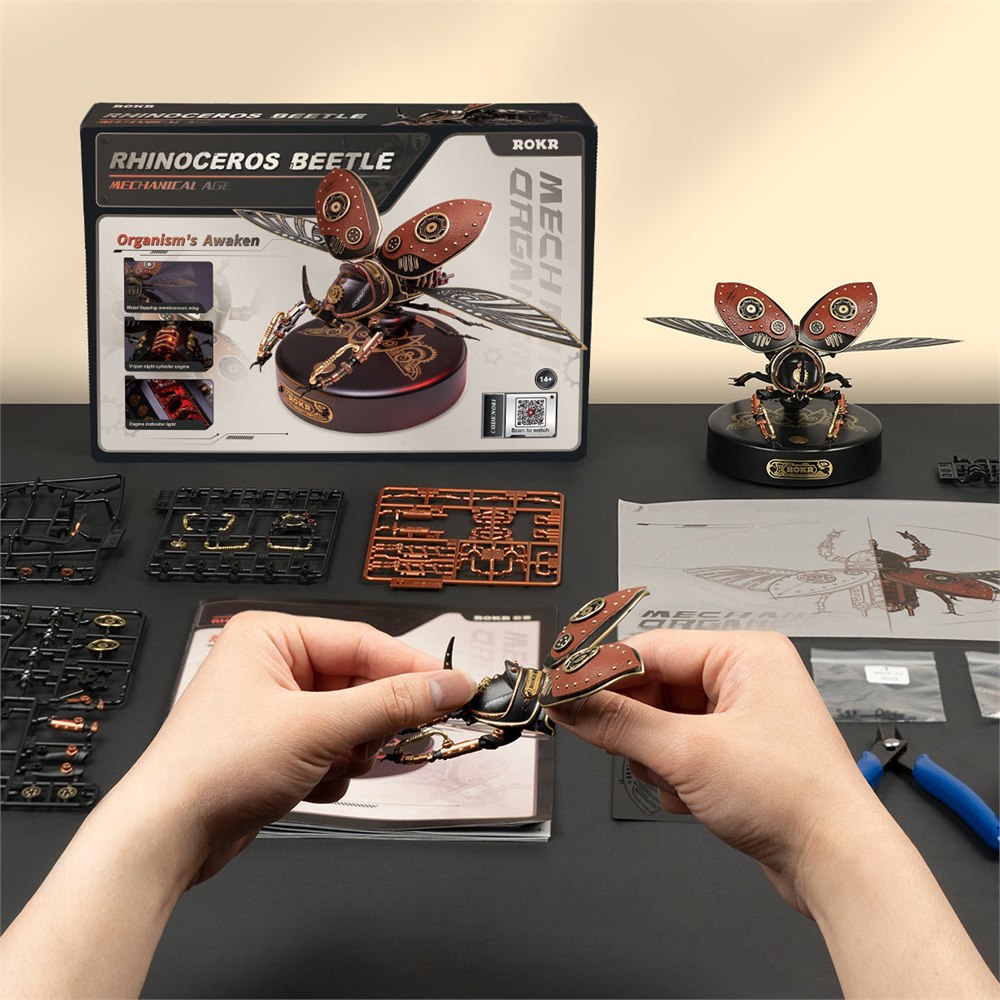 Assembly parts and hands building the ROKR beetle model