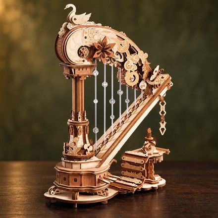 This Wooden Harp Music Box Plays While Its Gears and Swan Move