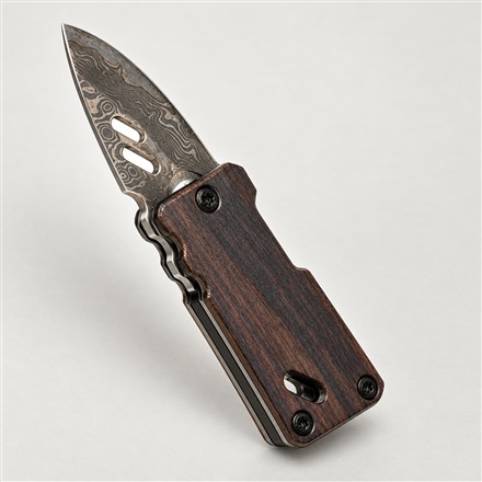 This Micro Damascus Pocket Knife Also Opens Bottles
