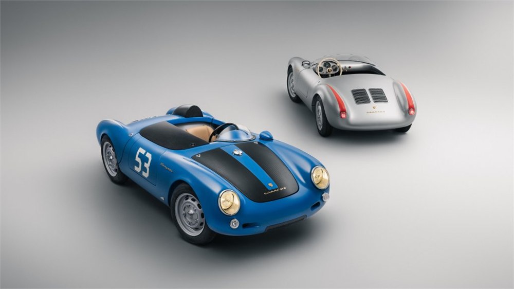 Blue and silver Porsche 550 J electric roadsters in an official studio photograph