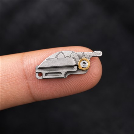 This Miniature Folding Knife Opens Packages and Fits on a Fingertip