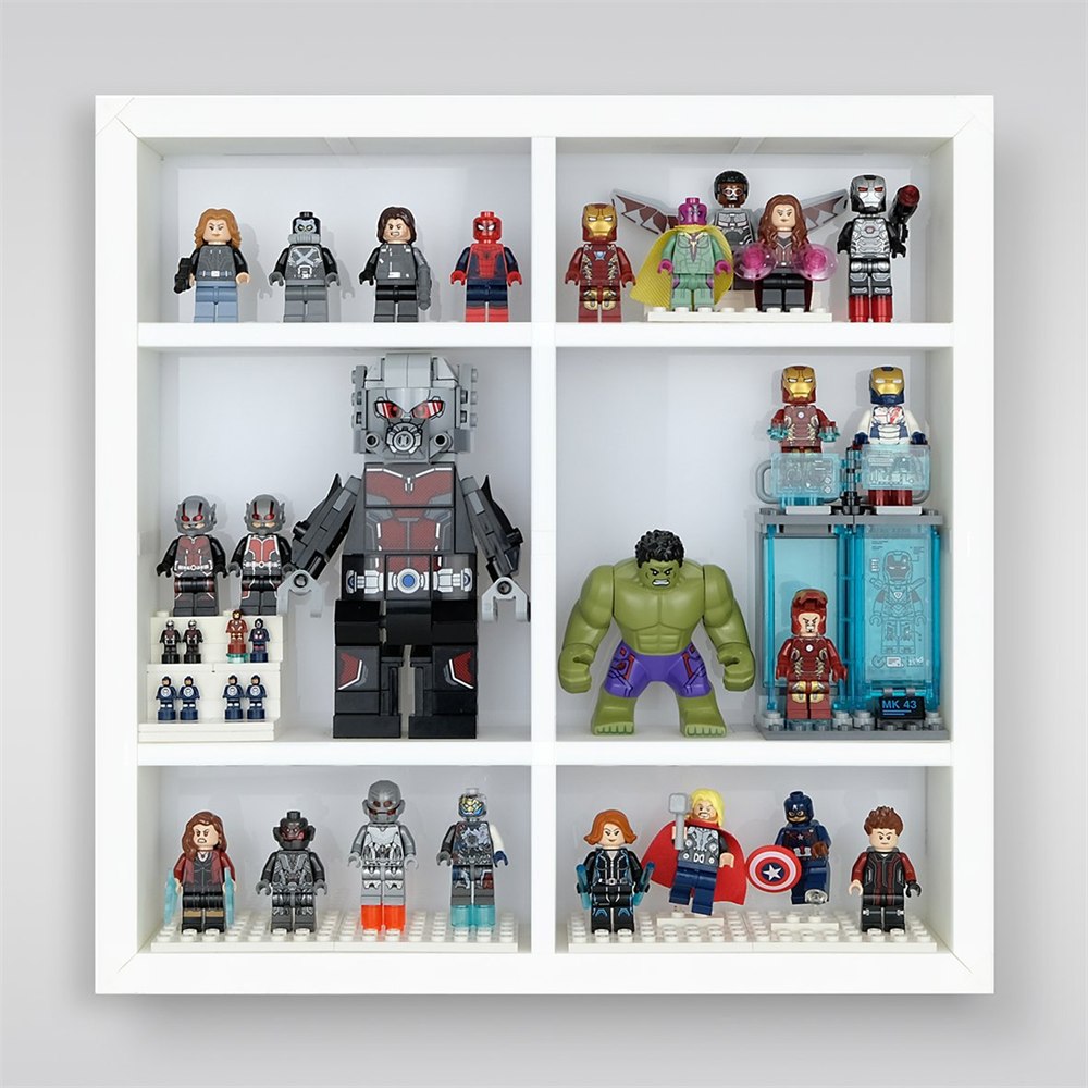 Removable dividers create space for larger superhero figures