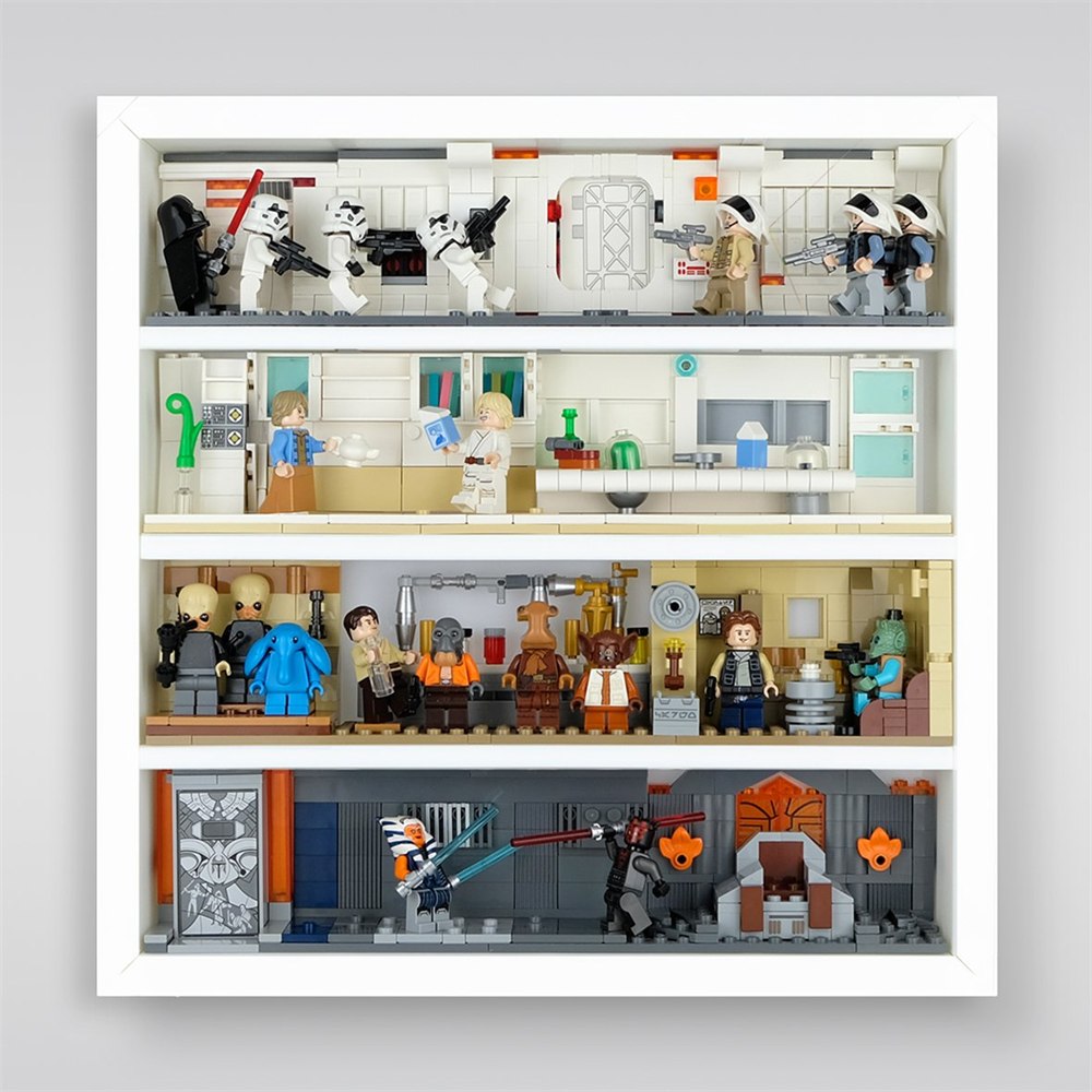 Dioramas arranged across the shelves of a white display frame