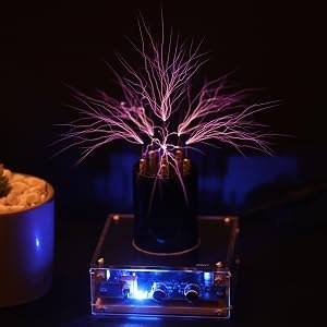 Front view of the Tesla coil operating with a blue illuminated base
