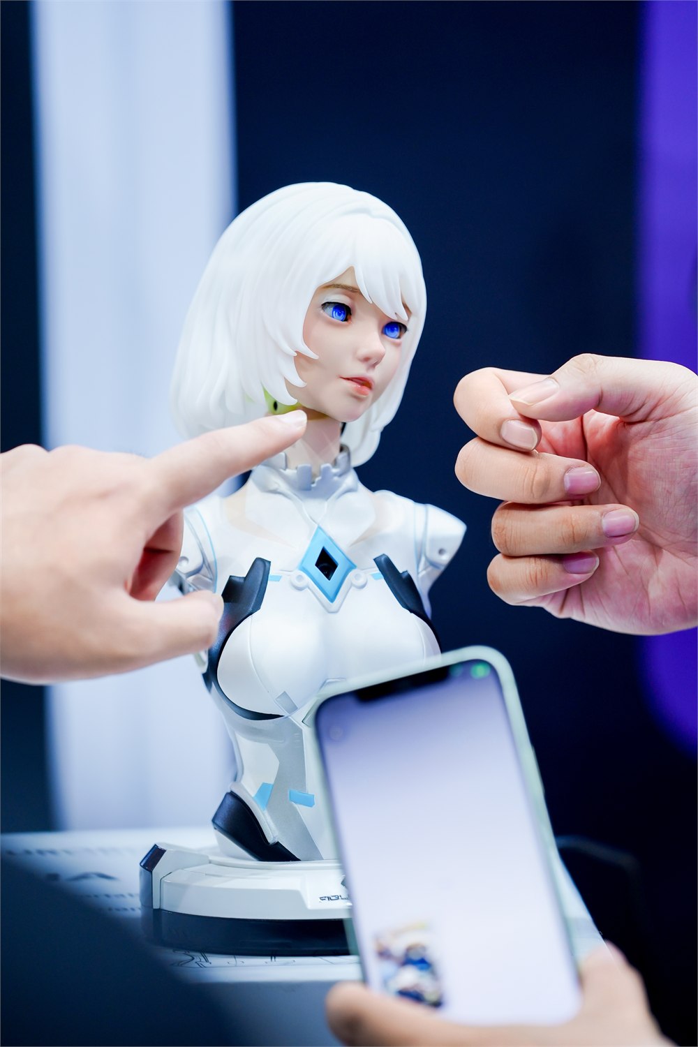 Close view of FR-NIA silicone face and torso at a demonstration