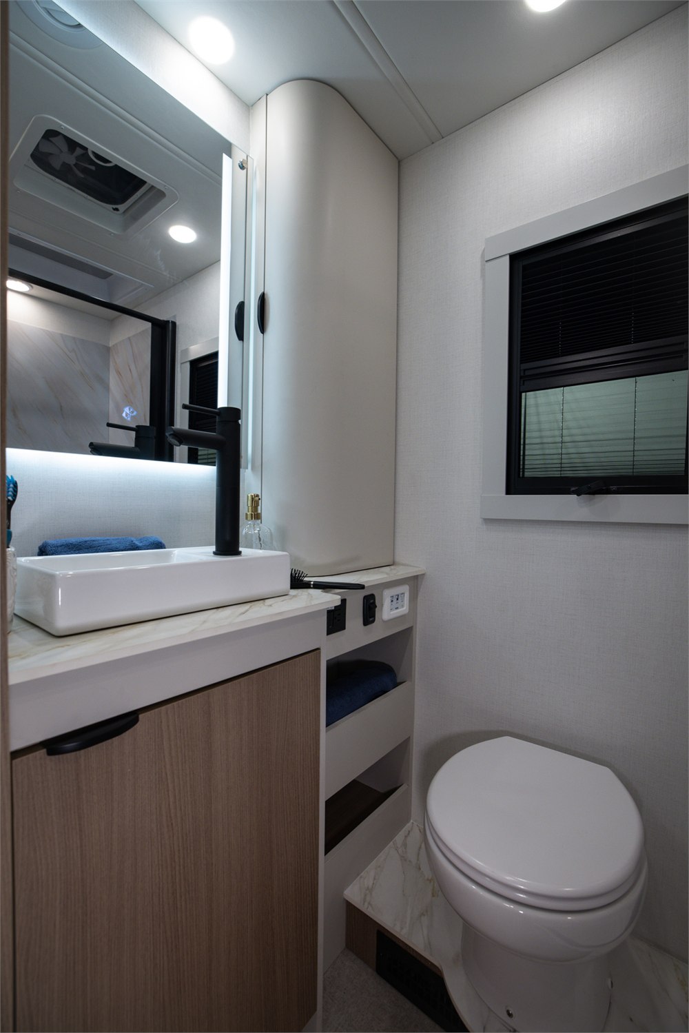 Origin bathroom with vessel sink and toilet