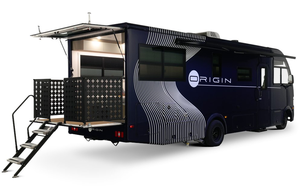 Coachmen Origin exterior with open rear hatch and deck