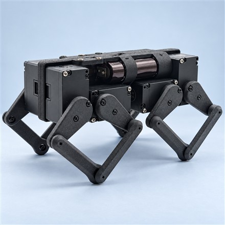 This Palm-Sized Robot Dog Lets You Program Its Walk, Jump, and Dance