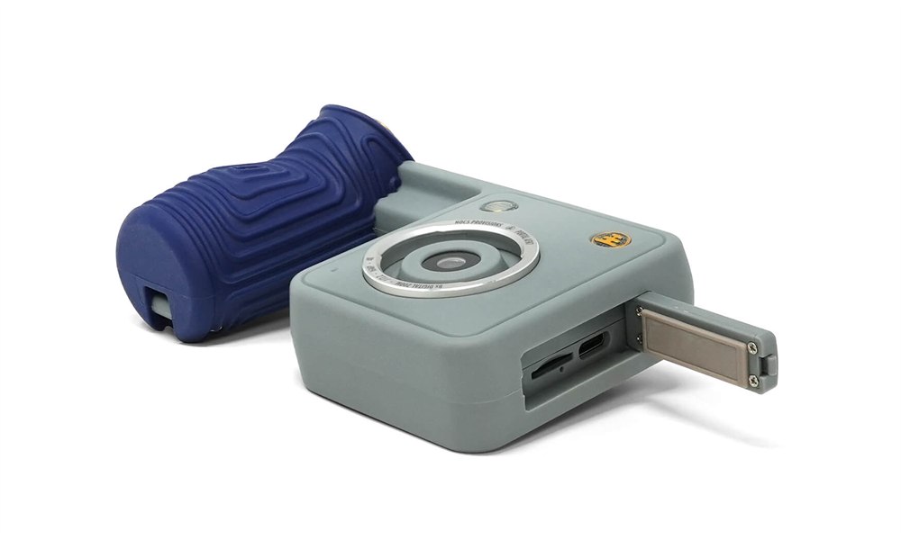 Portal camera with open USB-C and memory card compartment